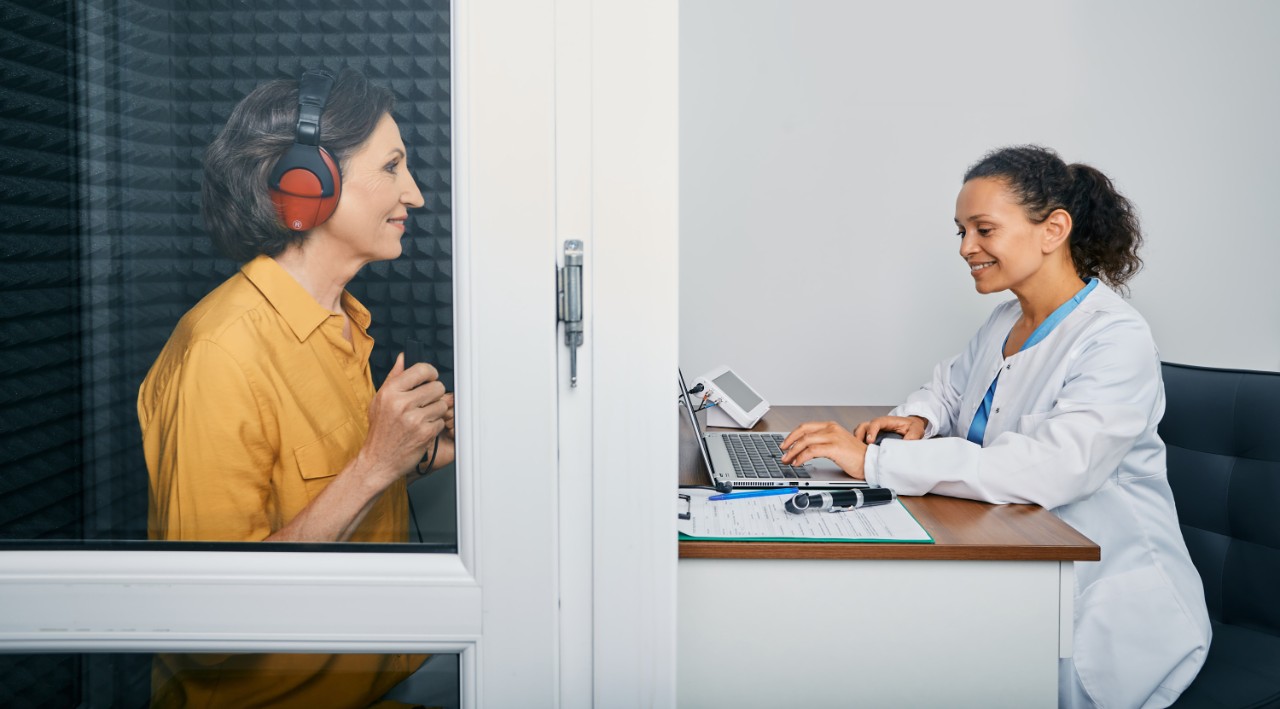 Woman getting a hearing evaluation