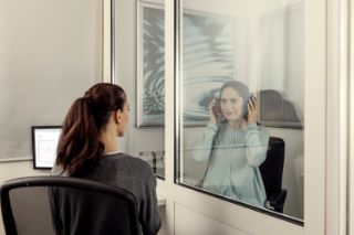 Woman getting  hearing test