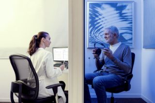 Man taking a hearing test 