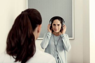 Woman getting a hearing test