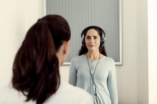 Woman getting a hearing test