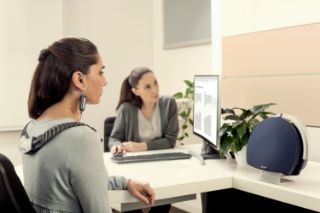 Woman looking at audiogram