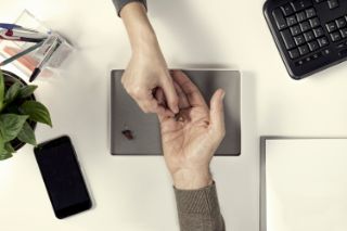 Handing over hearing aids