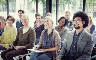 Gathering of people attending a meeting