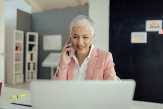 woman looking at computer