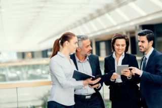 Men and women having a business meeting