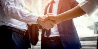 Two people shaking hands