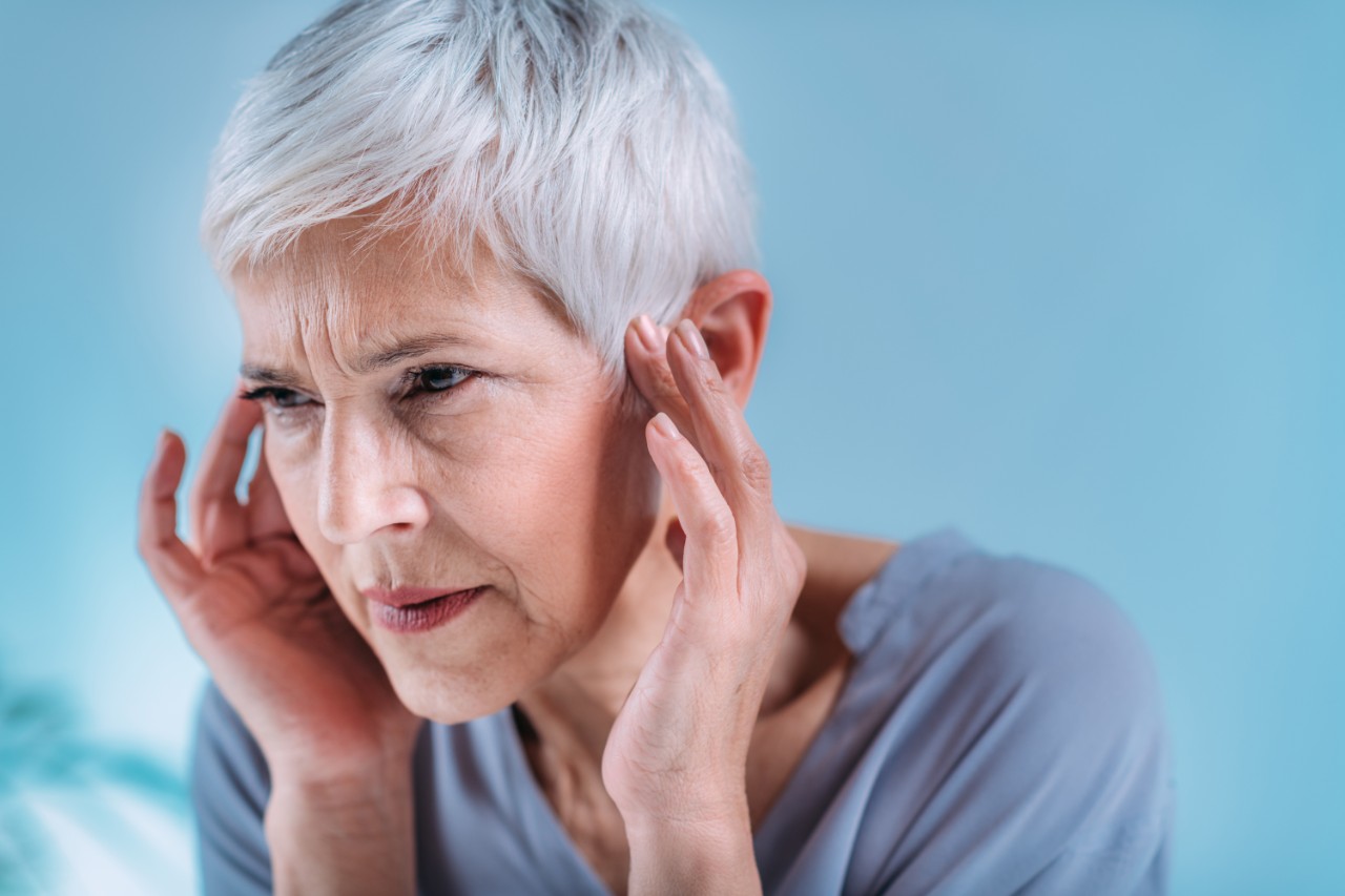 Senior woman with tinnitus