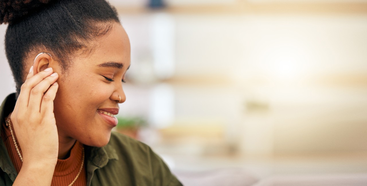 Young woman wearing hearing aid