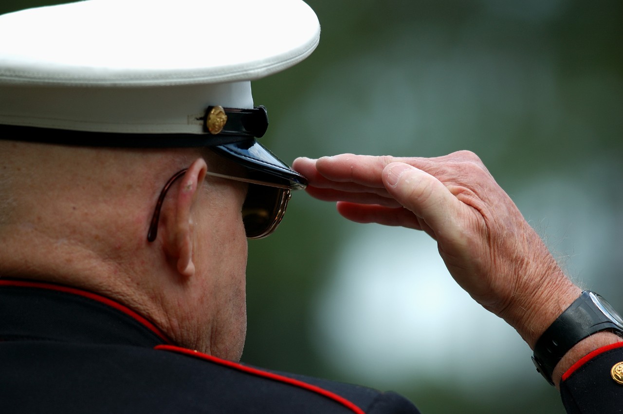 Retired marine saluting