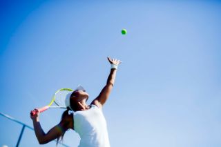 A woman playing tennis