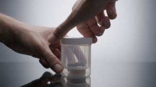 Hearing aid drying capsule