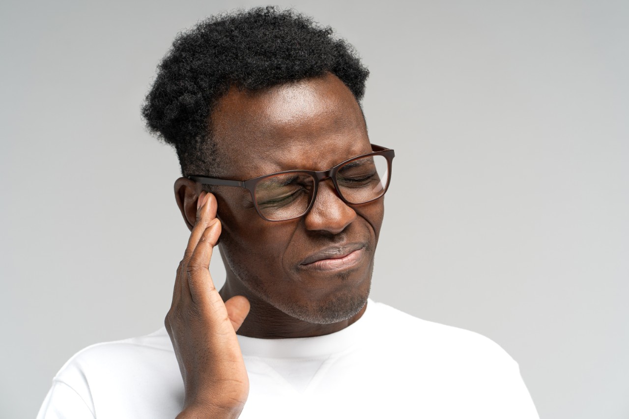 Man with ear pain