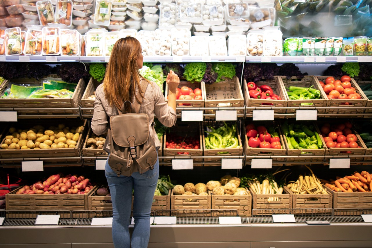 Woman selecting healthy food at the store