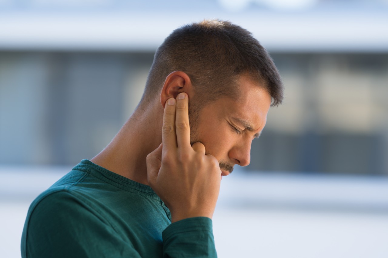 Man with ear pain