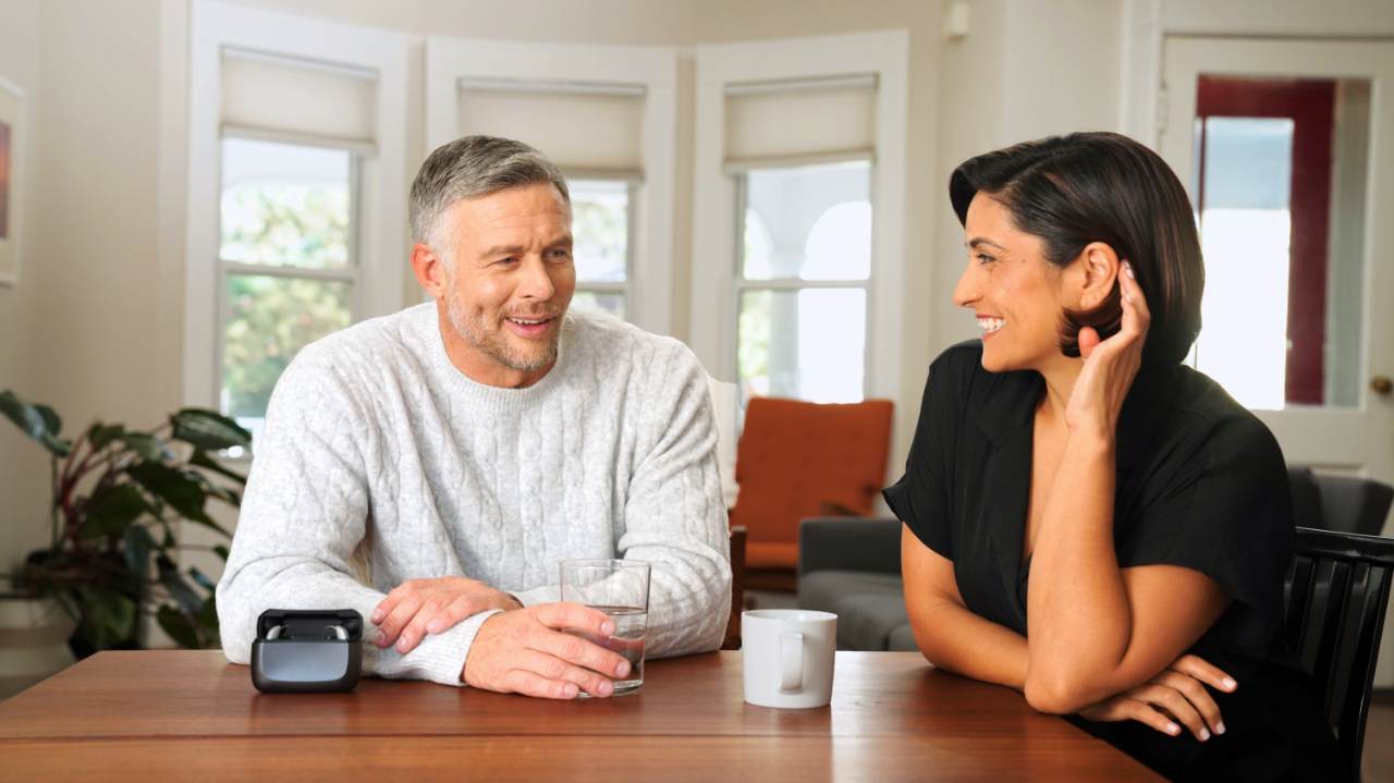 Couple talking to eachother and smiling