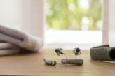 A pair of hearing aids on a table