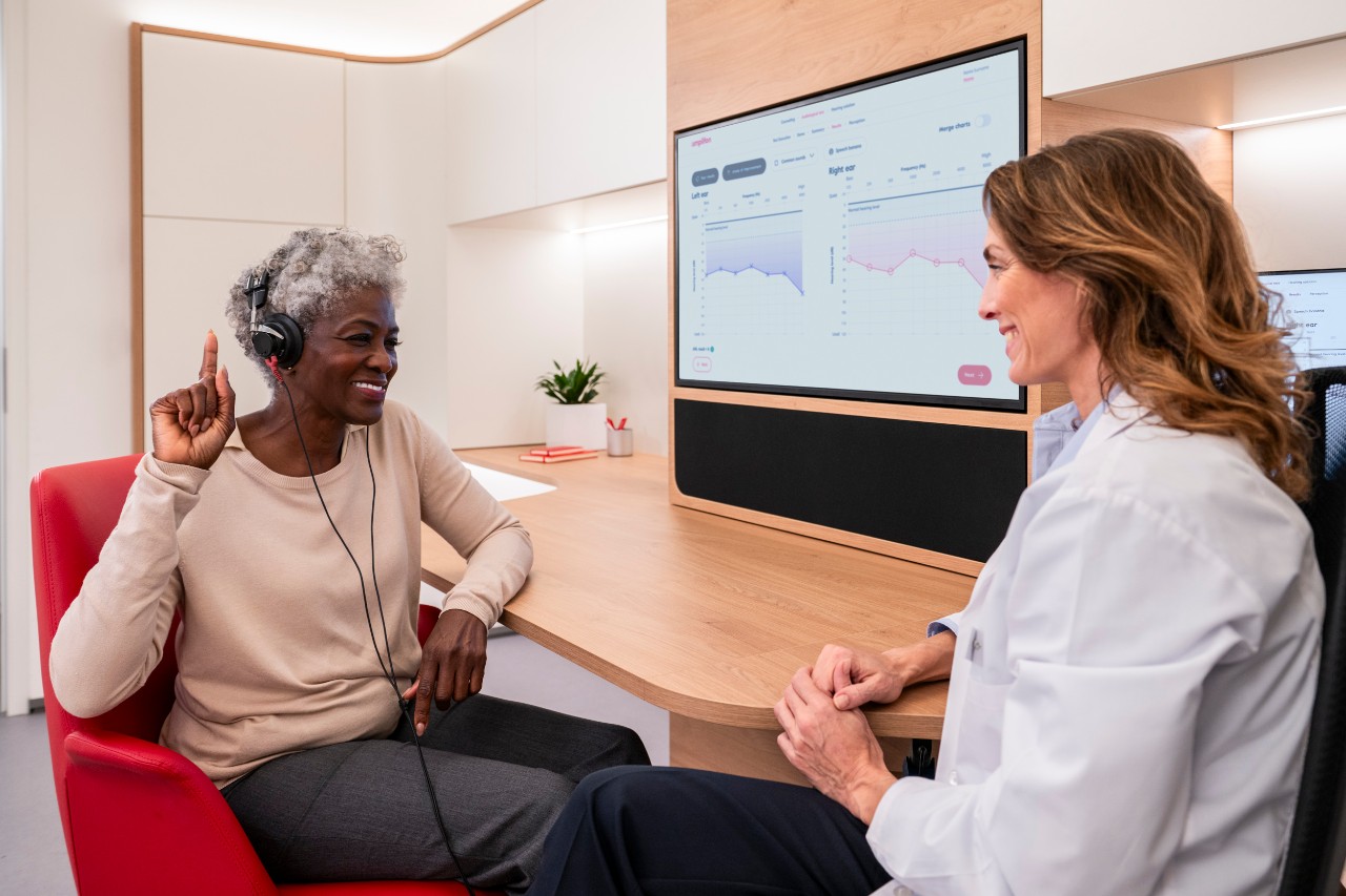 Senior woman getting hearing test