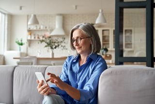 Woman scrolling on her mobile phone